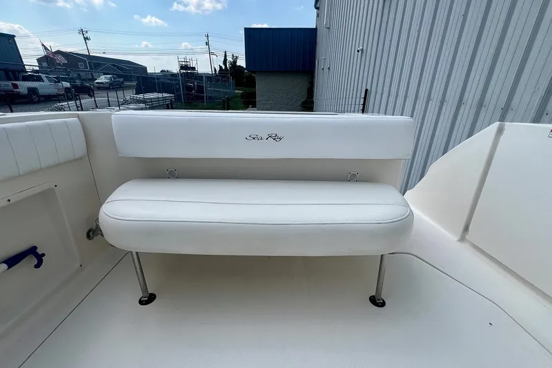 Slide: The Image of White bench seat on 2007 Sea Ray 270 Amberjack boat deck. - 8