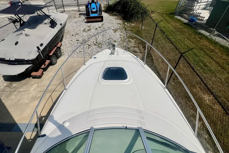 Slide: The Image of 2007 Sea Ray 270 Amberjack boat docked, aerial view of bow and deck area. - 20
