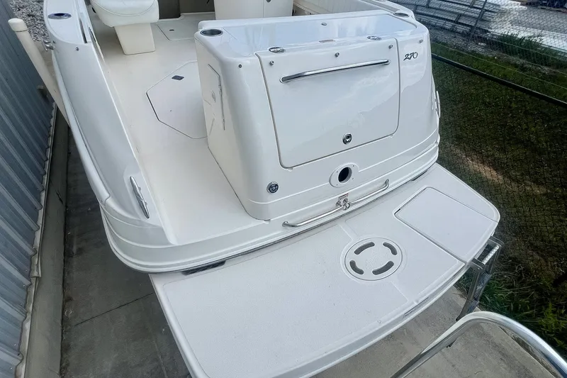 Slide: The Image of 2007 Sea Ray 270 Amberjack boat stern with swim platform and seating area. - 5