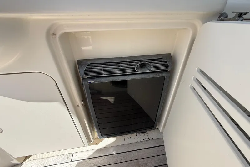 Slide: The Image of Built-in mini fridge on 2008 Sea Ray 38 Sundancer yacht deck. - 122