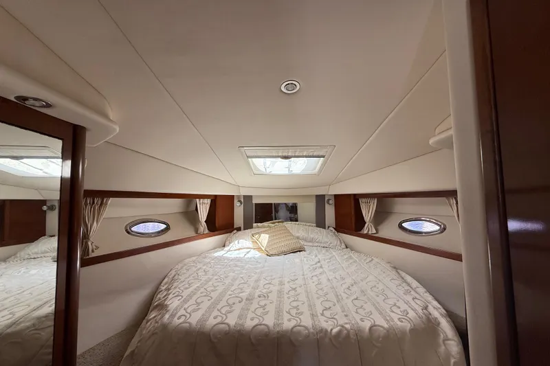 Slide: The Image of Luxurious cabin interior of 2008 Sea Ray 38 Sundancer yacht with elegant bedding. - 50