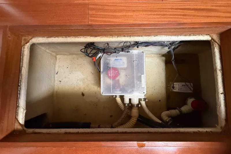 Slide: The Image of Bilge compartment of 2008 Sea Ray 38 Sundancer with wiring and pump system. - 73