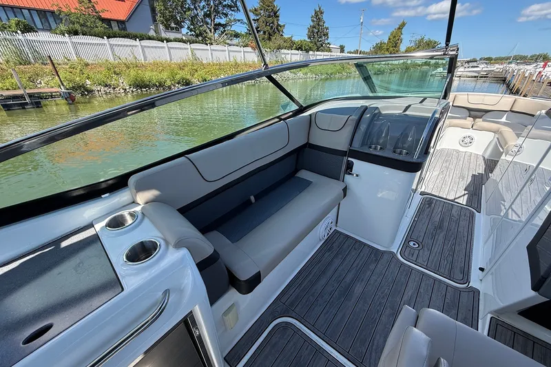Slide: The Image of 2013 Formula 310 Bowrider interior with sleek seating and modern design. - 28