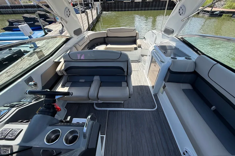Slide: The Image of 2013 Formula 310 Bowrider interior with luxurious seating and modern amenities. - 30
