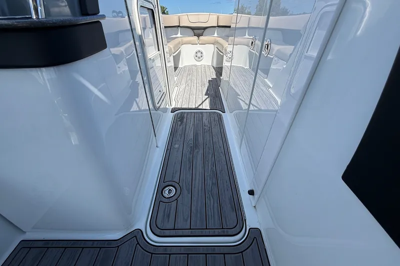 Slide: The Image of 2013 Formula 310 Bowrider interior with sleek flooring and comfortable seating. - 45