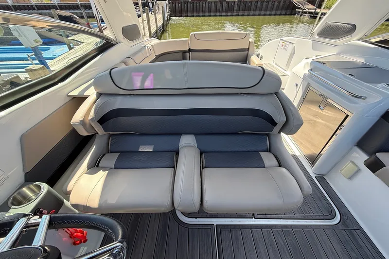Slide: The Image of 2013 Formula 310 Bowrider interior with luxurious seating and modern amenities. - 31
