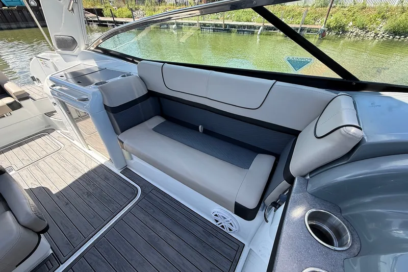 Slide: The Image of 2013 Formula 310 Bowrider interior with sleek seating and modern design. - 29