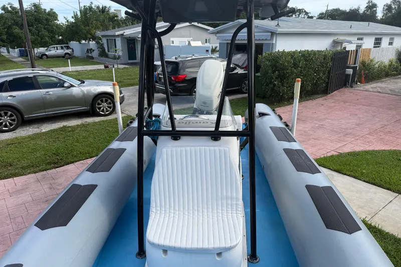Slide: The Image of 1998 Novamarine SEVEN HD inflatable boat parked in residential driveway. - 7