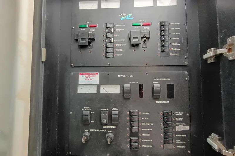 Slide: The Image of Electrical control panel of a 1997 Sea Ray 370 Aft Cabin boat. - 95