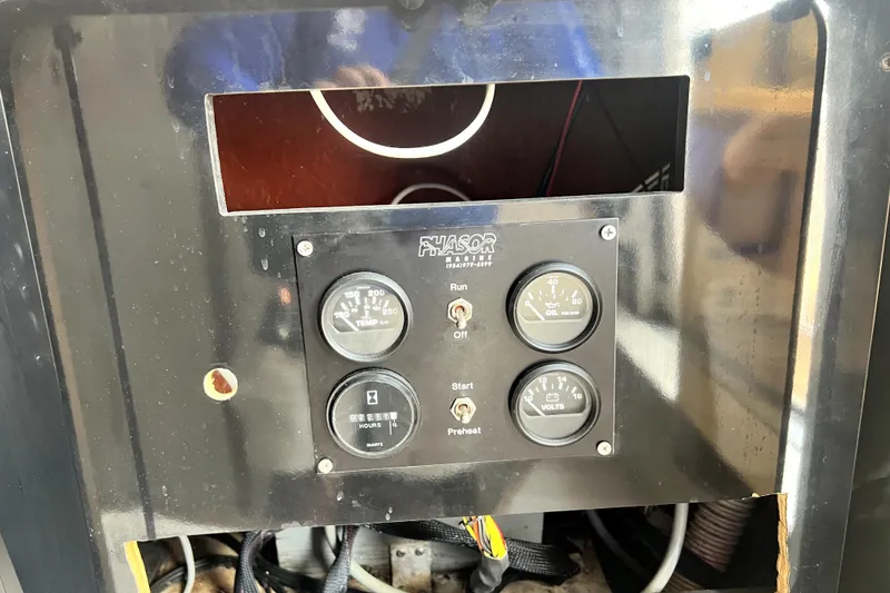 Slide: The Image of Control panel of a 1997 Sea Ray 450 Express Bridge boat. - 31