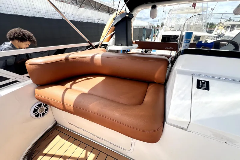 Slide: The Image of Luxurious leather seating on 1997 Sea Ray 450 Express Bridge yacht deck. - 27