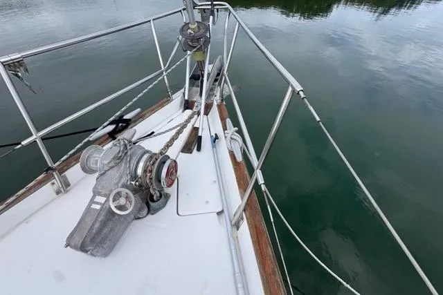 Slide: The Image of Bow of 1996 Beneteau 50 sailboat with anchor and winch system. - 26