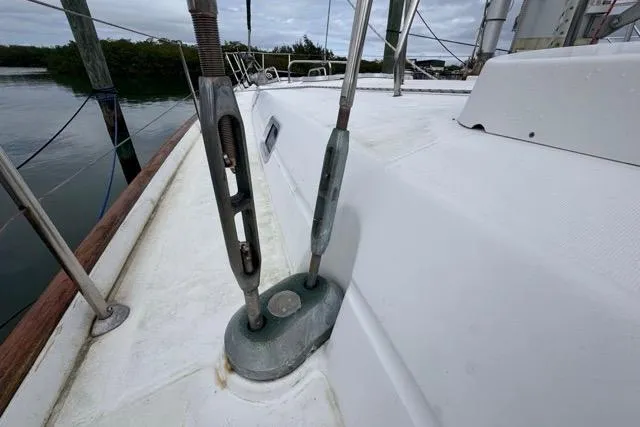 Slide: The Image of Close-up of 1996 Beneteau 50 sailboat deck with rigging details. - 16