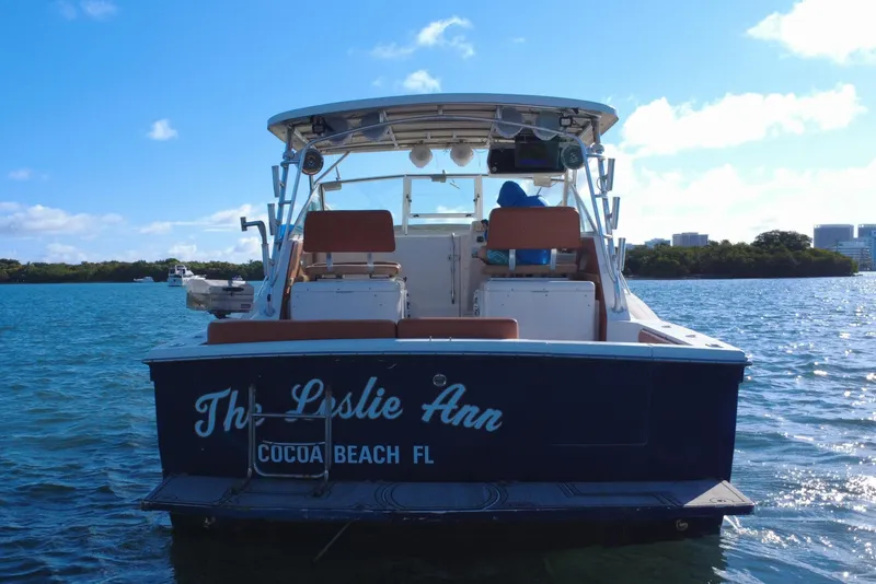 Slide: The Image of 1996 Wellcraft 330 Coastal boat on water in Cocoa Beach. - 11