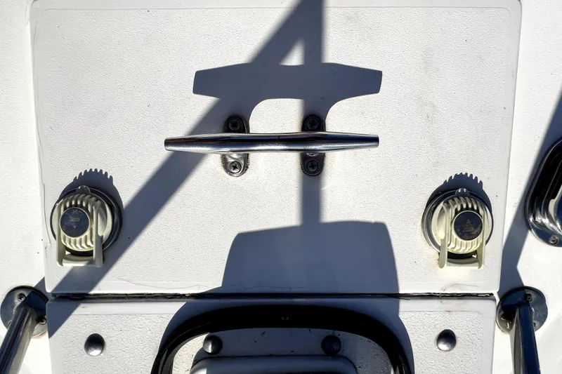 Slide: The Image of 1996 Wellcraft 330 Coastal boat deck with cleat and fuel caps. - 39