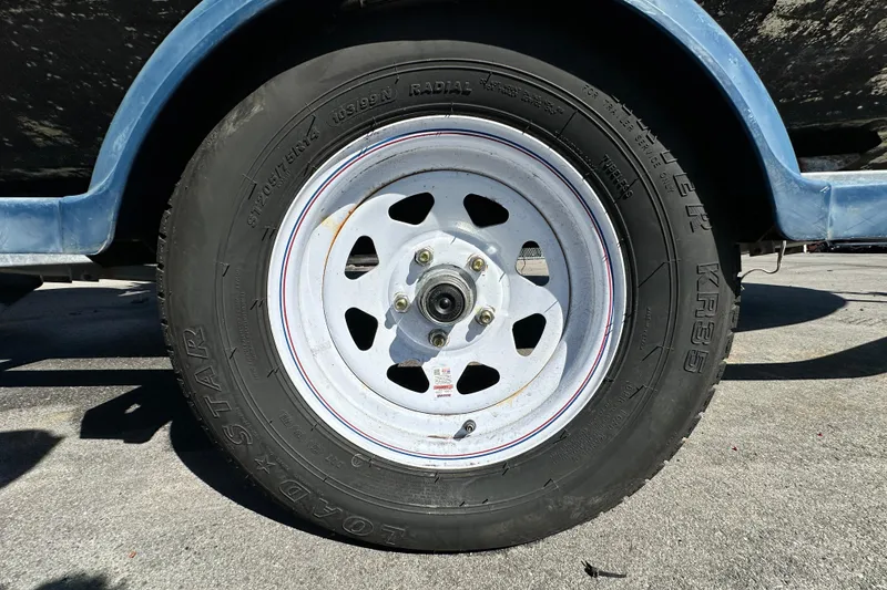 Slide: The Image of Trailer wheel of 1993 Hydra-Sports Bay Bolt 1900 boat, featuring Loadstar tire. - 65