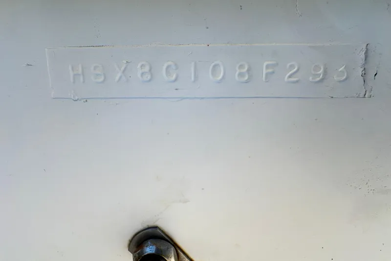 Slide: The Image of 1993 Hydra-Sports Bay Bolt 1900 hull identification number on white surface. - 66