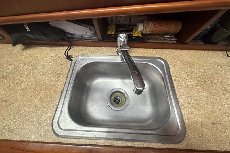 Slide: The Image of Stainless steel sink on 1991 Ocean Yachts 35 Super Sport boat. - 45