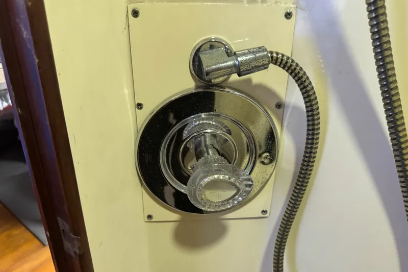Slide: The Image of Shower control panel on a 1991 Ocean Yachts 35 Super Sport boat. - 51