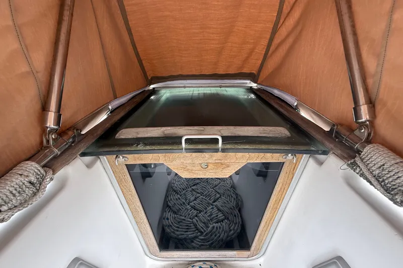 Slide: The Image of Interior view of 1990 Beneteau First 35s5 sailboat with ropes and hatch. - 19