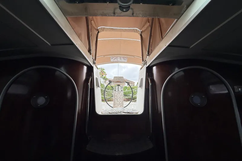 Slide: The Image of Interior view of 1990 Beneteau First 35s5 sailboat, showing cabin entrance and wheel. - 101