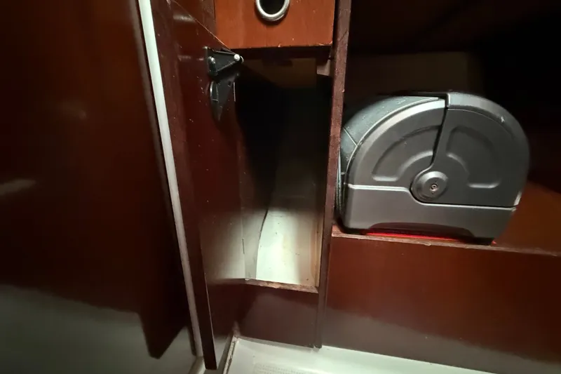 Slide: The Image of Interior storage compartment of a 1990 Beneteau First 35s5 sailboat. - 59