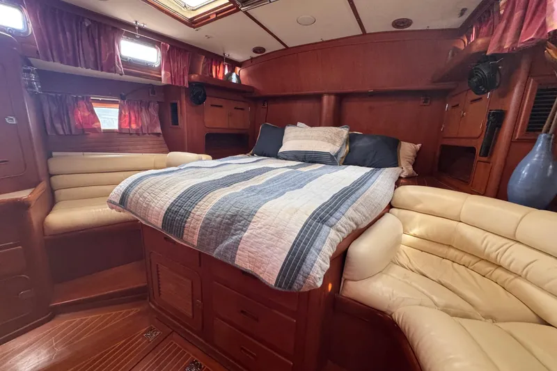 Slide: The Image of Luxurious cabin interior of 1989 Little Harbor Sloop 58' with cozy bed and seating. - 82