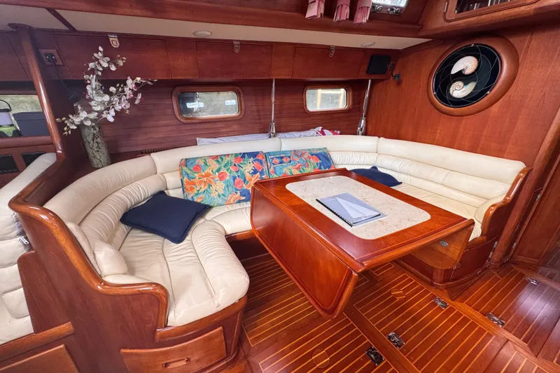 Slide: The Image of Luxurious 1989 Little Harbor Sloop 58' interior with elegant wood and leather seating. - 52