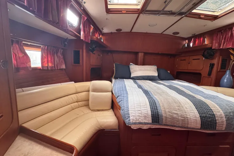 Slide: The Image of Luxurious cabin interior of 1989 Little Harbor Sloop 58' with cozy bed and seating. - 84