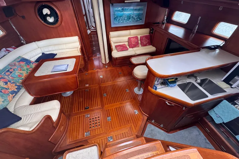 Slide: The Image of Luxurious 1989 Little Harbor Sloop interior with elegant wood finish and cozy seating area. - 45