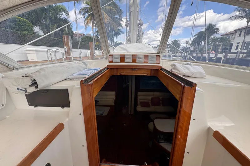 Slide: The Image of Interior view of 1989 Little Harbor Sloop 58' sailboat with wooden cabin entrance. - 43