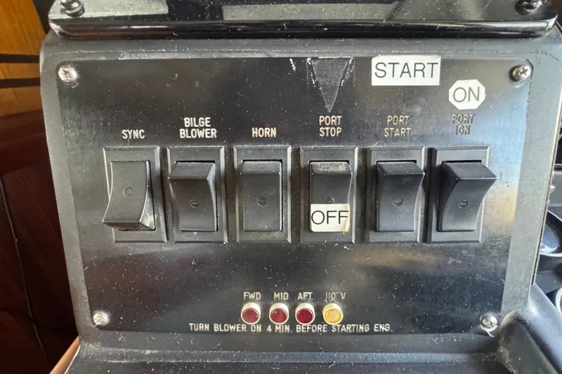 Slide: The Image of Control panel of a 1989 Ocean Yachts 48 Motor Yacht with various switches. - 79