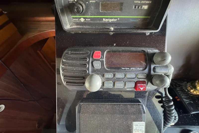 Slide: The Image of Control panel of a 1989 Ocean Yachts 48 Motor Yacht with navigation and communication equipment. - 78