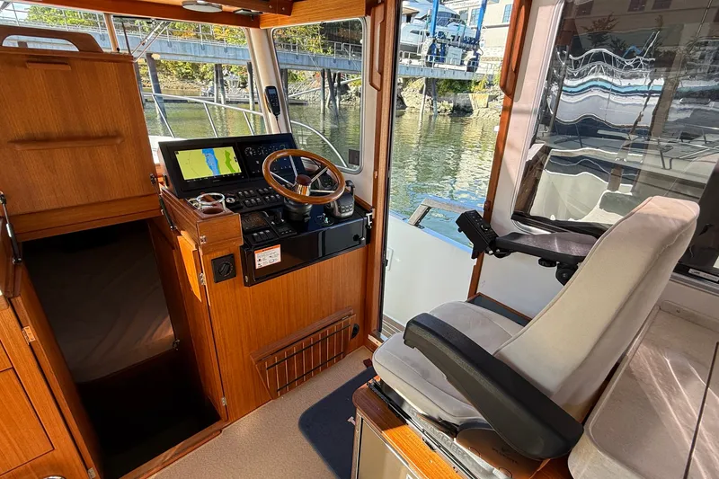 Slide: The Image of 2024 Targa 37 boat interior with navigation system and captain's chair. - 22