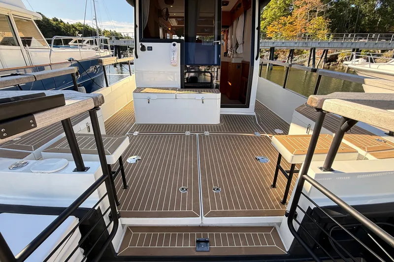 Slide: The Image of 2024 Targa 37 boat deck with seating, docked at marina. - 64