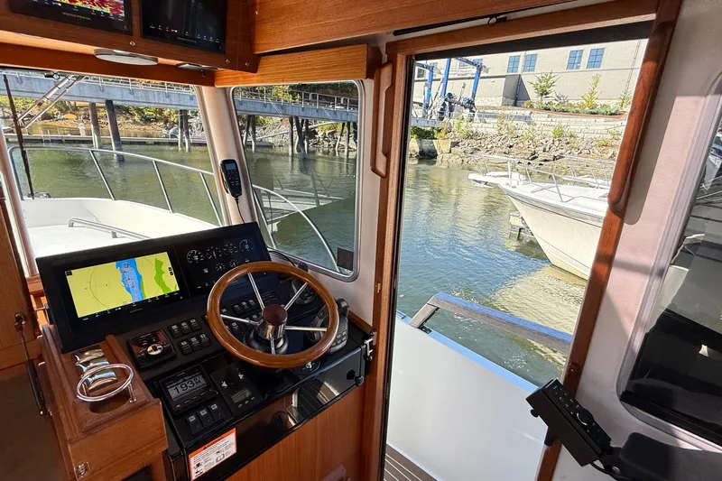 Slide: The Image of Interior view of 2024 Targa 37 boat cockpit with navigation system. - 54