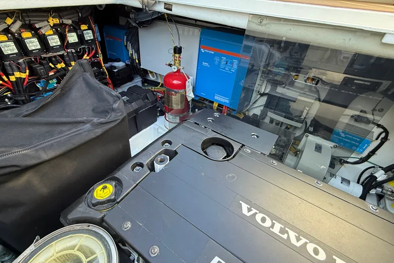 Slide: The Image of Engine room of 2024 Targa 37 boat featuring Volvo Penta components and electrical systems. - 68