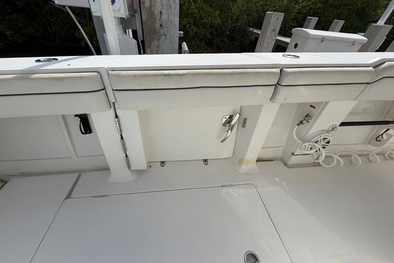 Slide: The Image of 2014 Jupiter 34 FS boat deck with seating and storage compartments. - 12