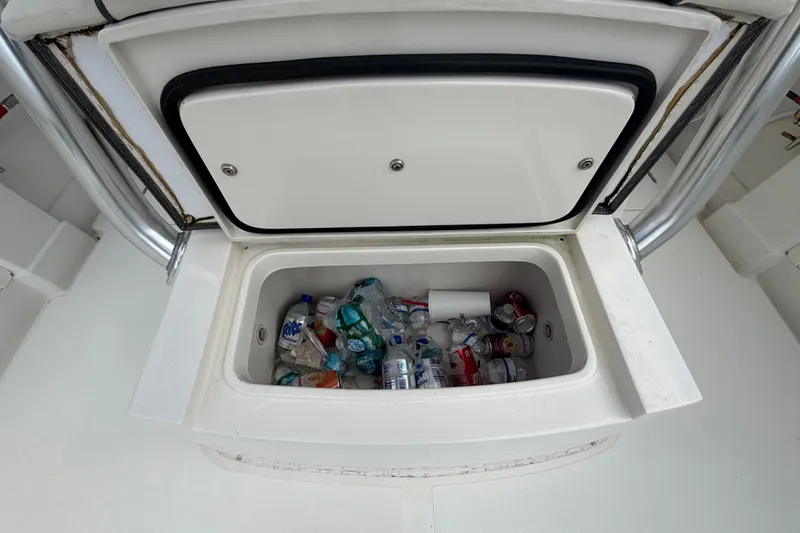 Slide: The Image of Open cooler on 2014 Jupiter 34 FS boat, filled with assorted drinks and ice. - 76