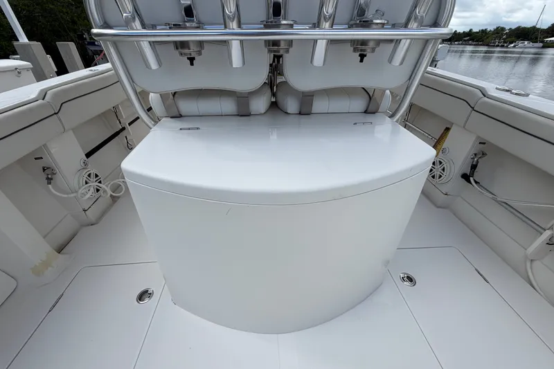 Slide: The Image of 2014 Jupiter 34 FS boat interior with seating and storage compartments. - 19