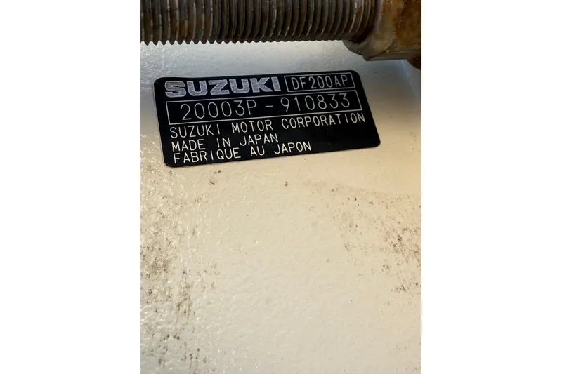 Slide: The Image of Label on Suzuki DF200AP engine, serial number 20003P-910833, made in Japan. - 37