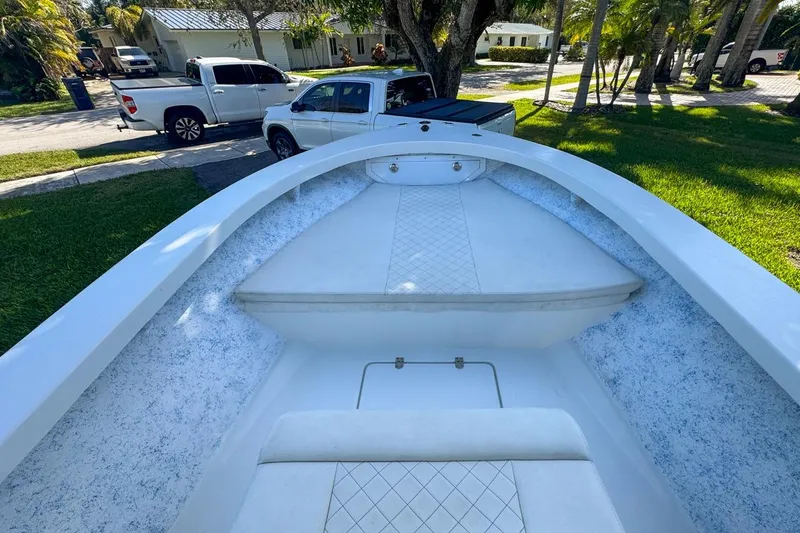 Slide: The Image of 1972 Cuda Craft Open Fisherman boat interior with white seating and textured sides. - 29
