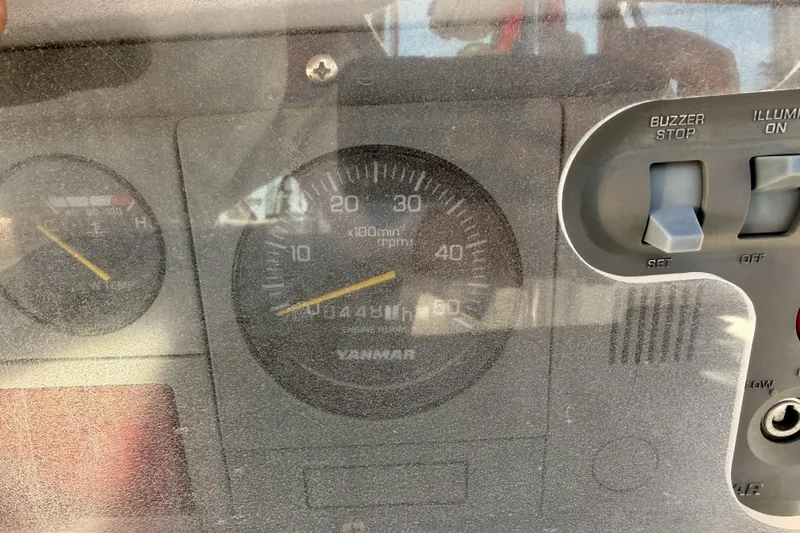 Slide: The Image of Close-up of a 2005 Hunter Passage 456 boat dashboard with Yanmar tachometer. - 91
