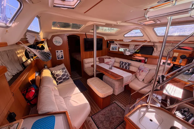 Slide: The Image of Luxurious interior of 2005 Hunter Passage 456 yacht with cozy seating and elegant decor. - 42