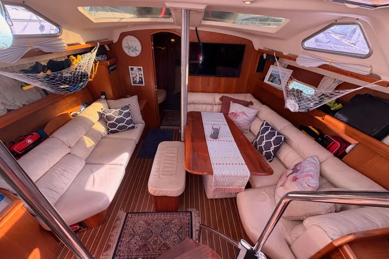 Slide: The Image of Luxurious interior of 2005 Hunter Passage 456 yacht with cozy seating and elegant decor. - 33