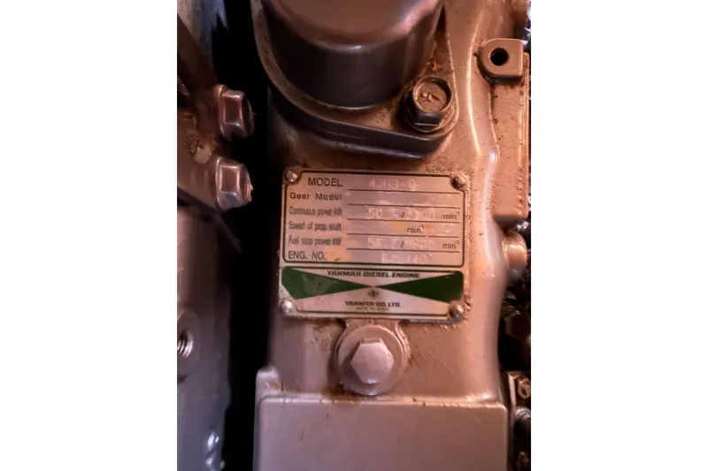 Slide: The Image of Close-up of a Yanmar diesel engine label on a 2005 Hunter Passage 456. - 88