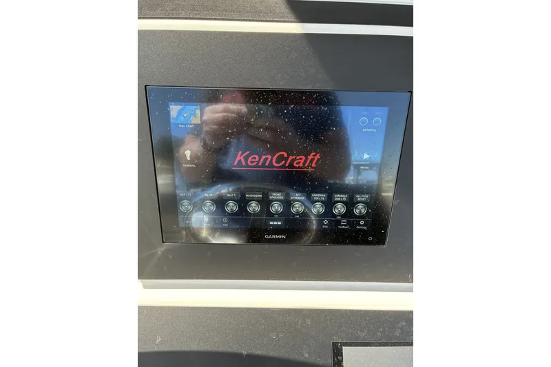 Slide: The Image of Display screen of 2024 KenCraft 215 Center Console boat with Garmin interface. - 23