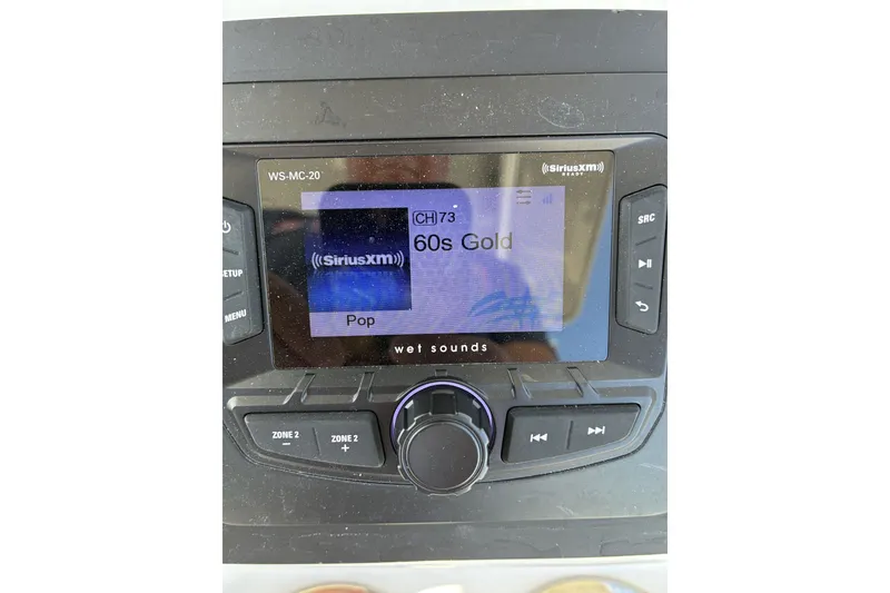Slide: The Image of Wet Sounds WS-MC-20 stereo displaying SiriusXM 60s Gold channel on KenCraft 215 Center Console. - 25