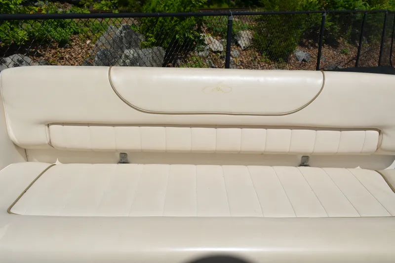 Slide: The Image of Cream-colored seating on a 2001 Monterey 282 Cruiser boat. - 9