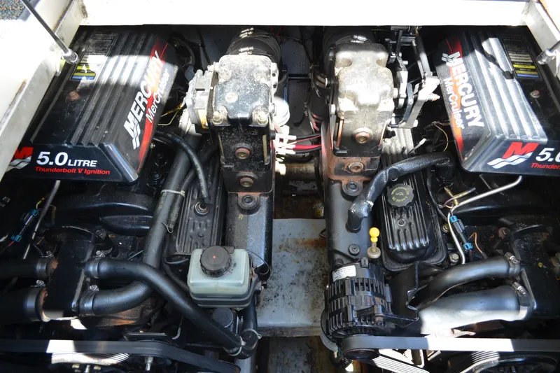 Slide: The Image of Engine compartment of a 2001 Monterey 282 Cruiser with dual Mercury 5.0L engines. - 37